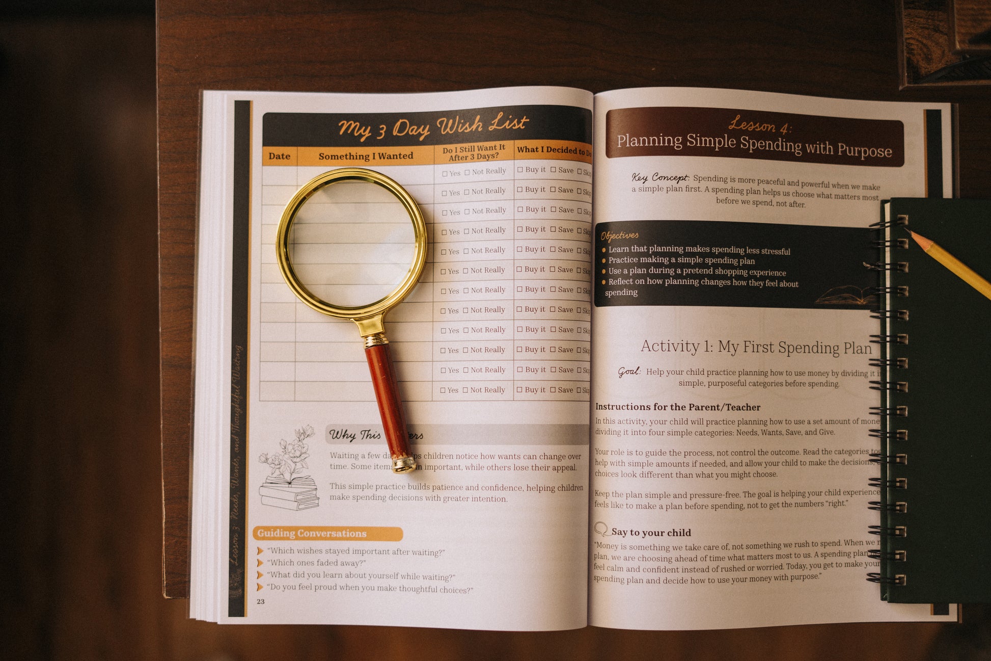 Open educational book with a magnifying glass on top, on a wooden surface